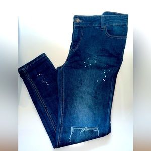 Denim jeans, allover paint splatter accents,with distressing at the knees Sz 14